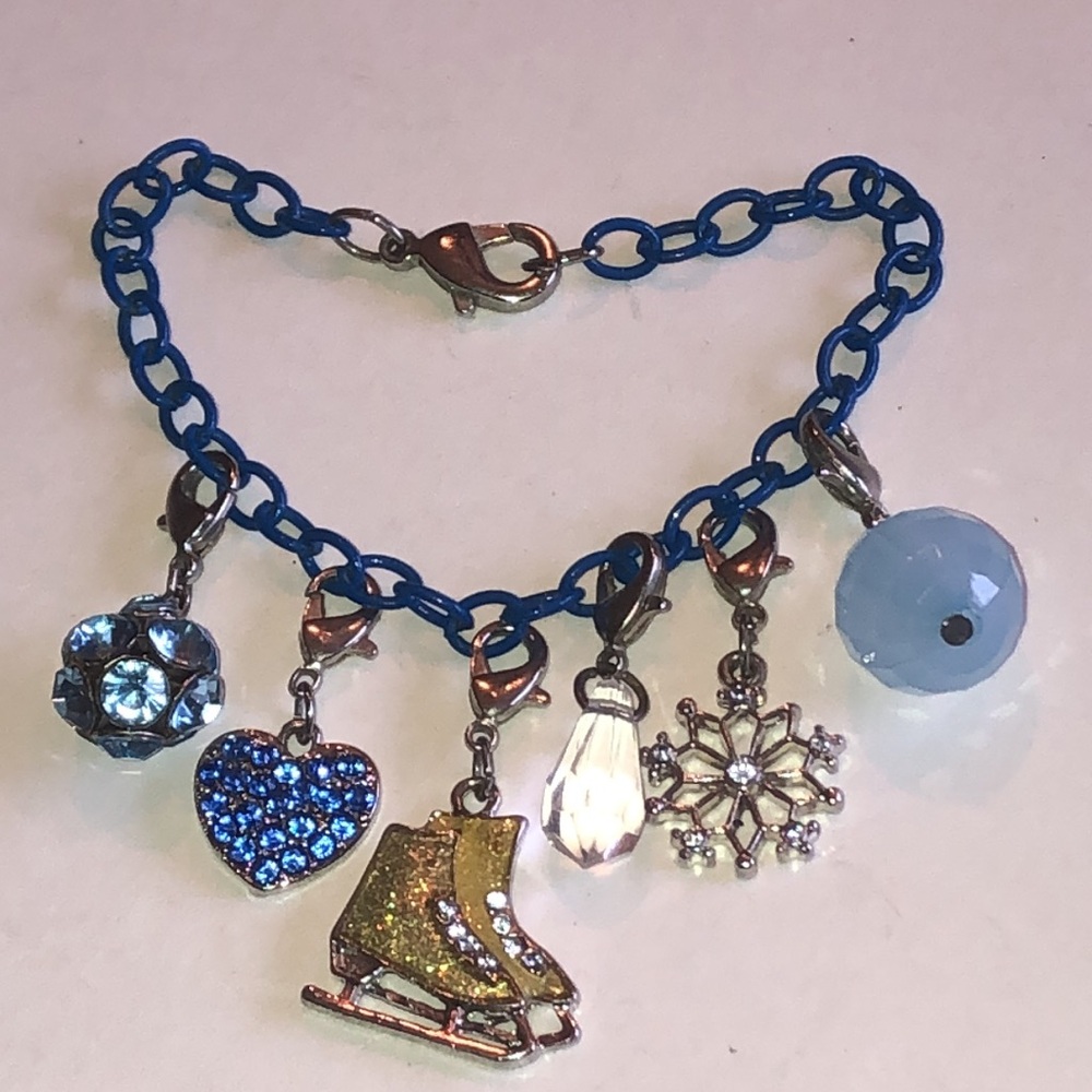 Blue Charm Bracelet with Ice Skate and Silver Tone Snowflake